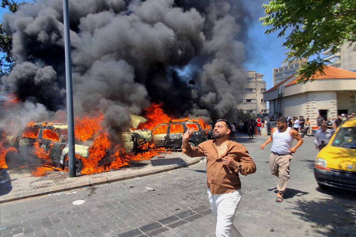 People run in front of burned cars that were attacked in an Israeli airstrike in the southern port city of Sidon, Lebanon, Wednesday, June 10, 2026. (AP Photo/Mohammed Zaatari) People run in front of burned cars that were attacked in an Israeli airstrike in the southern port city of Sidon, Lebanon, Wednesday, June 10, 2026. (AP Photo/Mohammed Zaatari)