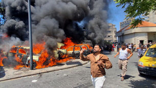 <p>People run in front of burned cars that were attacked in an Israeli airstrike in the southern port city of Sidon, Lebanon, Wednesday, June 10, 2026. (AP Photo/Mohammed Zaatari)</p> <p>People run in front of burned cars that were attacked in an Israeli airstrike in the southern port city of Sidon, Lebanon, Wednesday, June 10, 2026. (AP Photo/Mohammed Zaatari)</p>