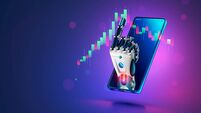 Robot trader. AI for automation trading on stock market. Hand robot point at candlestick graph on screen phone. Artificial intel