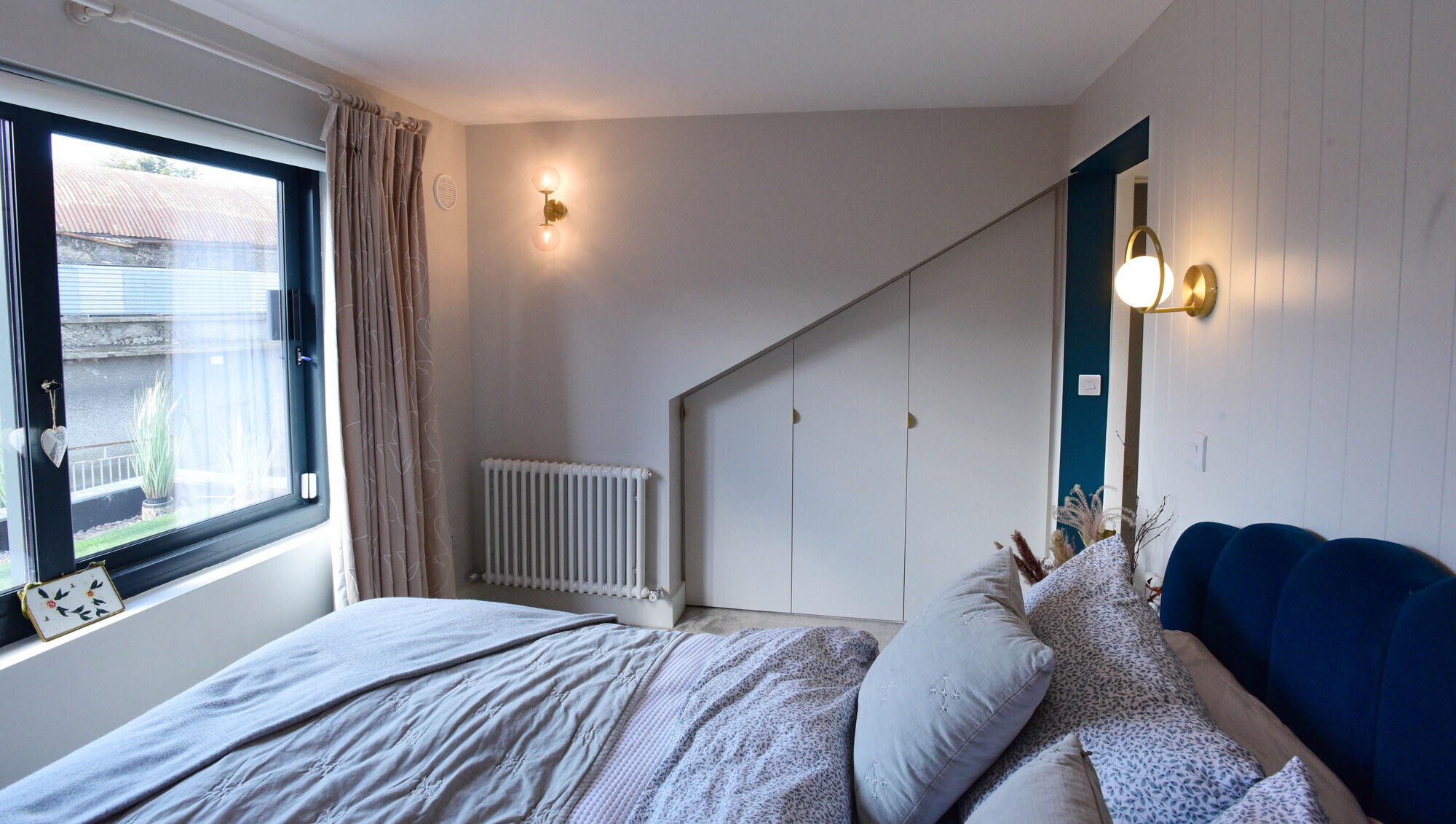 Jennifer Sheahan's large bedroom window faces southwest. Picture: Moya Nolan