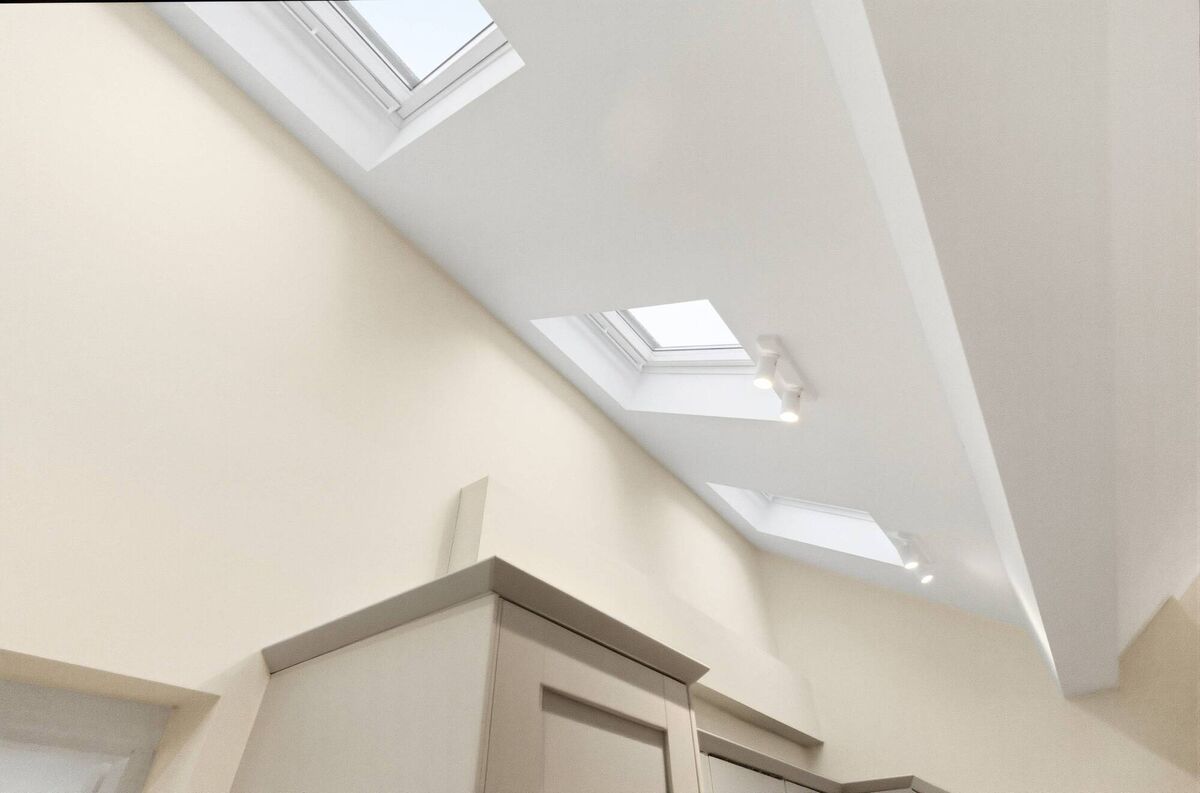 Velux windows funnel light down from the vaulted ceiling Velux windows funnel light down from the vaulted ceiling