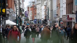 <p>Shoppers on Grafton Street in Dublin. 'Every vacant shopfront on a main street represents more than a failed business. It represents lost employment, lost footfall, lost local identity, lost community life, and fewer opportunities for the next generation.' File picture: Bloomberg</p>