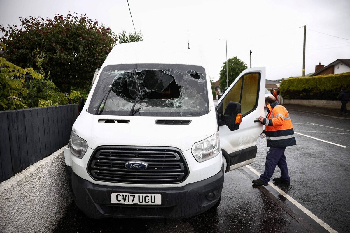 A damaged vehicle, with its windscreen smashed in, is prepared for towing away following violence by masked protesters. Picture: Henry Nicholls/Getty Images A damaged vehicle, with its windscreen smashed in, is prepared for towing away following violence by masked protesters. Picture: Henry Nicholls/Getty Images