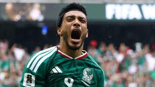 <p>OPENING ROAR: Mexico's Raul Jimenez celebrates scoring their second goal in the opening World Cup victory over nine-man South Africa at Estadio Azteca in Mexico City. Pic: Pawel Kopczynski, Reuters</p>