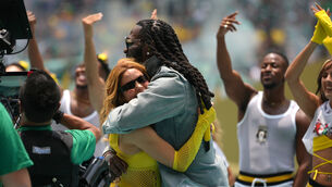 <p>Shakira and Burna Boy embrace during the opening ceremony before the World Cup Group A soccer match between Mexico and South Africa in Mexico City (Eduardo Verdugo/AP)</p>