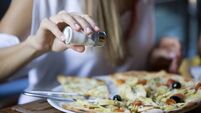 Salting pizza