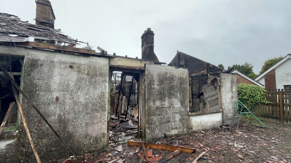 A general view of a house in the Sandyknowles area of Newtownabbey burnt out in the second night of unrest in Belfast following a knife attack on Monday. Northern Ireland saw a second night of unrest with police using water cannons on rioters, as the Belfast stabbing attack victim's family said they were "disgusted" by the disorder. Picture: PA A general view of a house in the Sandyknowles area of Newtownabbey burnt out in the second night of unrest in Belfast following a knife attack on Monday. Northern Ireland saw a second night of unrest with police using water cannons on rioters, as the Belfast stabbing attack victim's family said they were "disgusted" by the disorder. Picture: PA