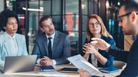 Business persons discussing a new contract