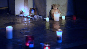 <p>Candles and tributes left following a vigil held outside Gaelscoil Cholaiste Mhuire school on Parnell Square. Picture: Niall Carson/PA Wire</p> <p>Candles and tributes left following a vigil held outside Gaelscoil Cholaiste Mhuire school on Parnell Square. Picture: Niall Carson/PA Wire</p>