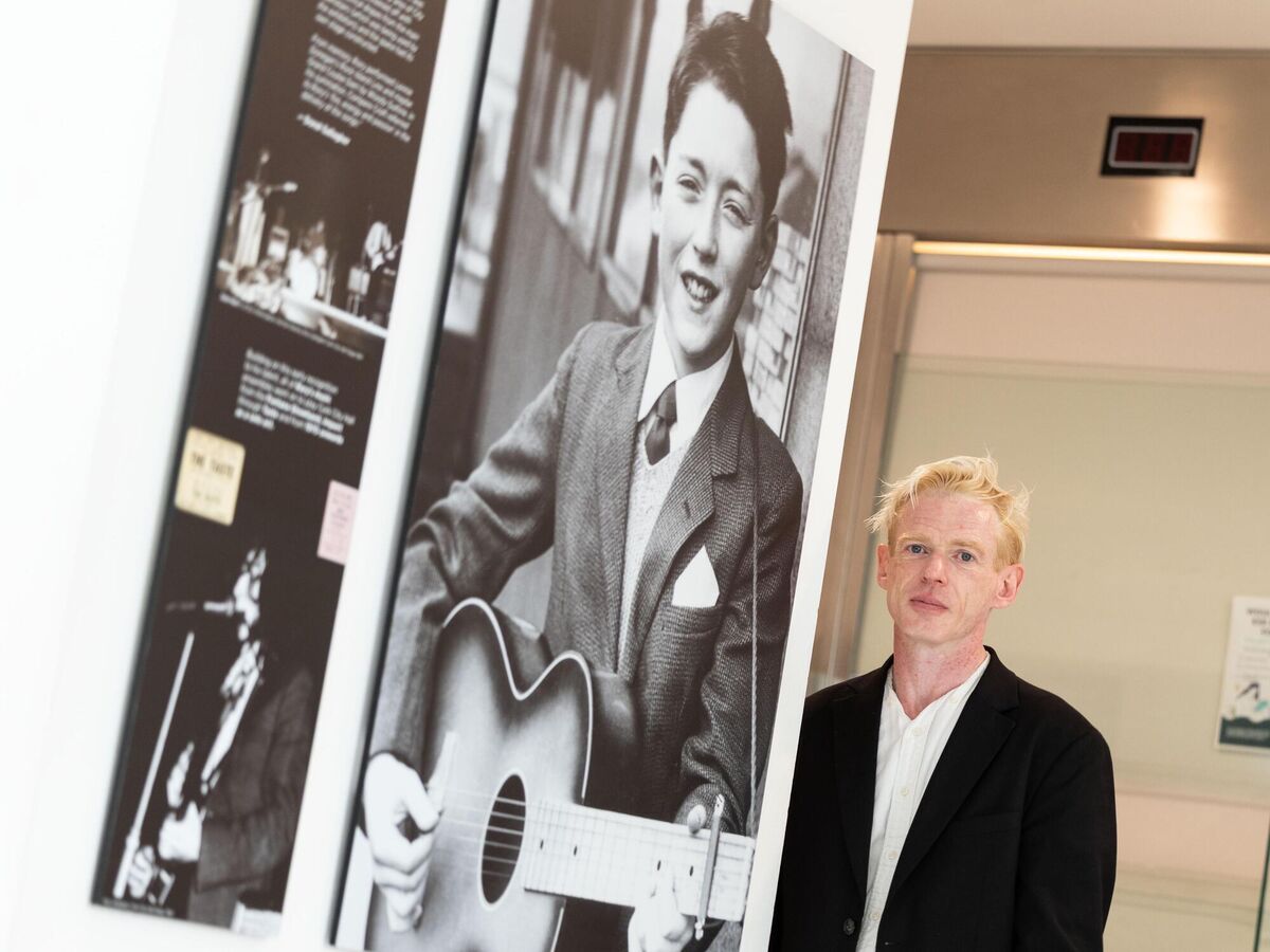 Eoin Gallagher, nephew of Rory Gallagher, with Rory's first every press picture, which appeared in the Evening Echo. Eoin Gallagher, nephew of Rory Gallagher, with Rory's first every press picture, which appeared in the Evening Echo.