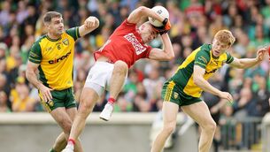 <p>Cork's Ian Maguire with Caolan McGonagle and Ciarán Moore battle for the ball. Pic: ©INPHO/Laszlo Geczo.</p>