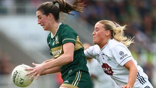 <p>Kerry’s Emma Costello and Hazel McLoughlin of Kildare. Picture: James Crombie/Inpho</p>