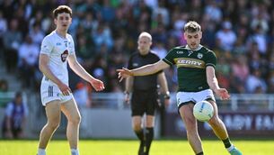 <p>Graham O'Sullivan goes for a point in Newbridge. Pic: Piaras Ó Mídheach/Sportsfile</p>