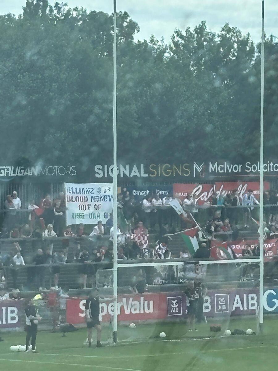 Protests behind the goal in Omagh ahead of Tyrone v Mayo over the GAA's continued links to Allianz. Pic: Brendan O'Brien.