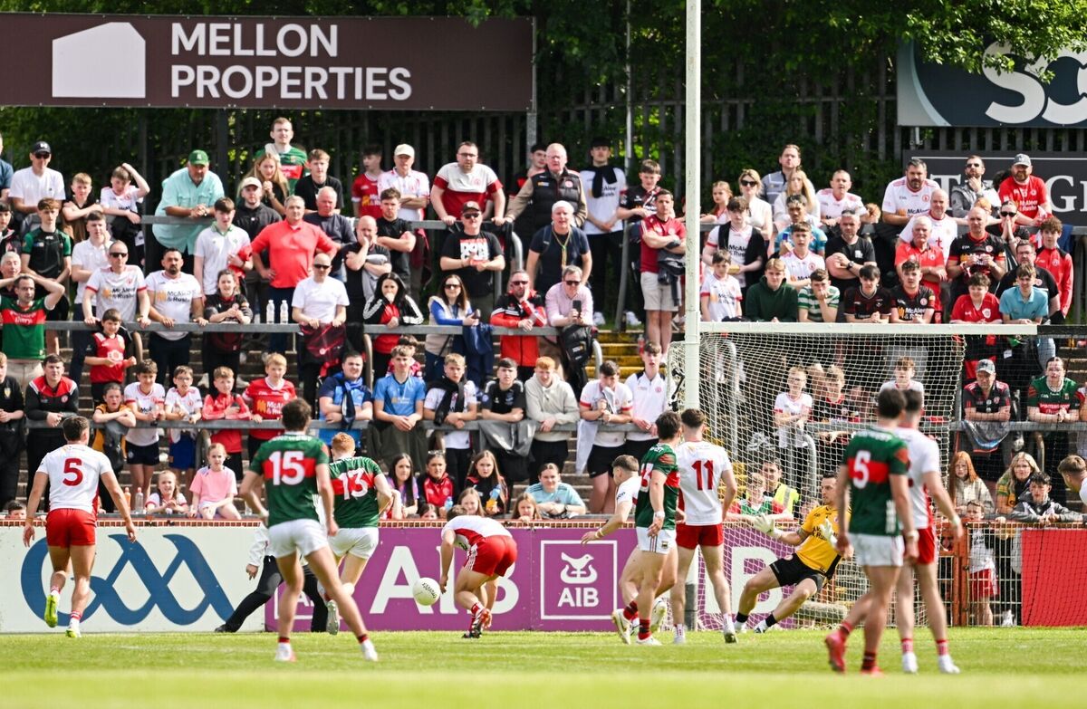 Darragh Beirne of Mayo, 13, shoots to score his side's goal past Tyrone goalkeeper Niall Morgan. Pic: Ramsey Cardy/Sportsfile Darragh Beirne of Mayo, 13, shoots to score his side's goal past Tyrone goalkeeper Niall Morgan. Pic: Ramsey Cardy/Sportsfile