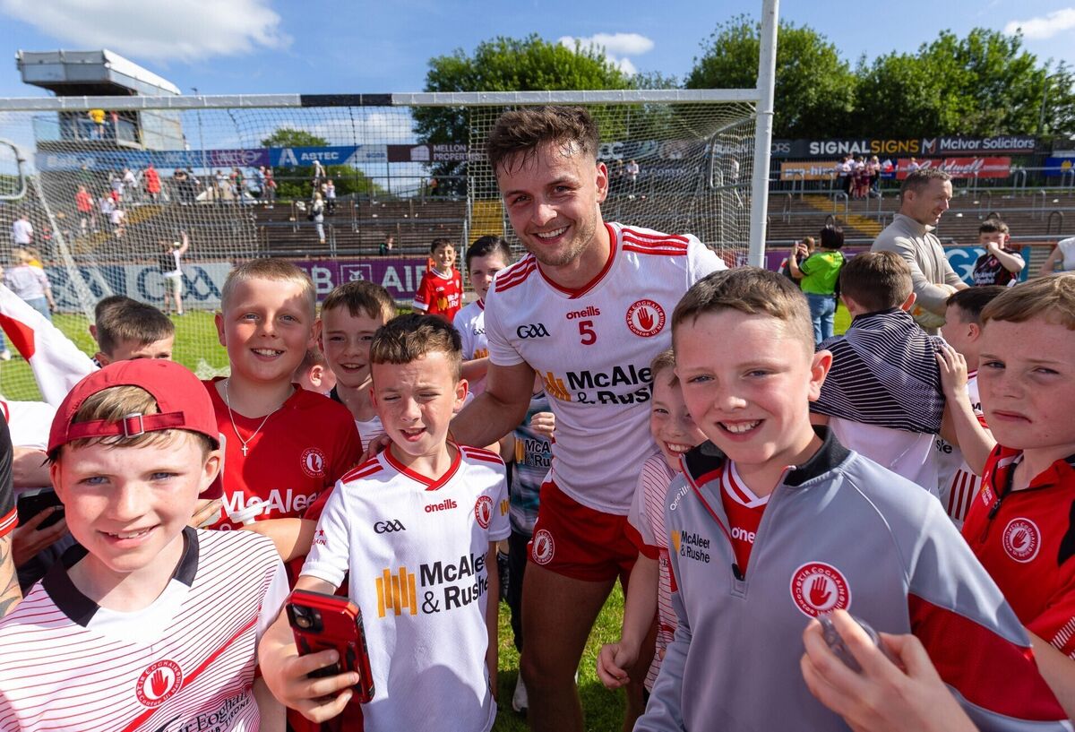 Tyrone's Michael McKernan with fans after the game. Pic: ©INPHO/Tom O’Hanlon.