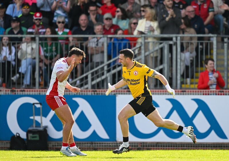 Tyrone goalkeeper Niall Morgan, right, celebrates with Michael McKernan after kicking the match winning score against Mayo. Pic: Ramsey Cardy/Sportsfile Tyrone goalkeeper Niall Morgan, right, celebrates with Michael McKernan after kicking the match winning score against Mayo. Pic: Ramsey Cardy/Sportsfile