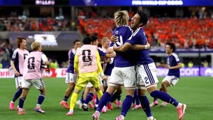 <p>Junya Ito and Yukinari Sugawara celebrate Japan's dramatic late equaliser against The Netherlands. Picture: Francois Nel/Getty</p> <p>Junya Ito and Yukinari Sugawara celebrate Japan's dramatic late equaliser against The Netherlands. Picture: Francois Nel/Getty</p>
