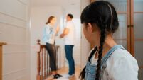Stressed and unhappy young girl hide from domestic violence at home. Synchronos