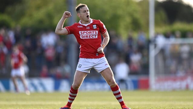 <p>DOWNTOWN: Steven Sherlock of Cork celebrates kicking a two-point score against Meath at Páirc Uí Rinn. Pic: Ben McShane/Sportsfile</p>