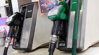 unleaded petrol and diesel fuel pumps at a self service petrol station in the UK