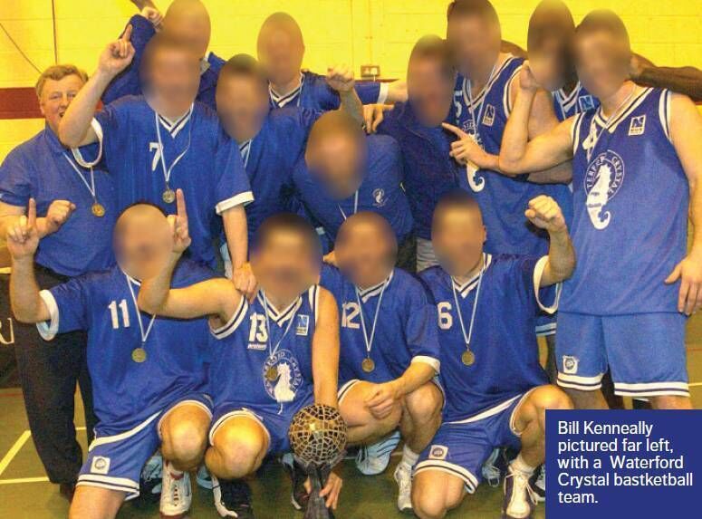 Bill Kenneally pictured far left, with a Waterford Crystal basketball team.