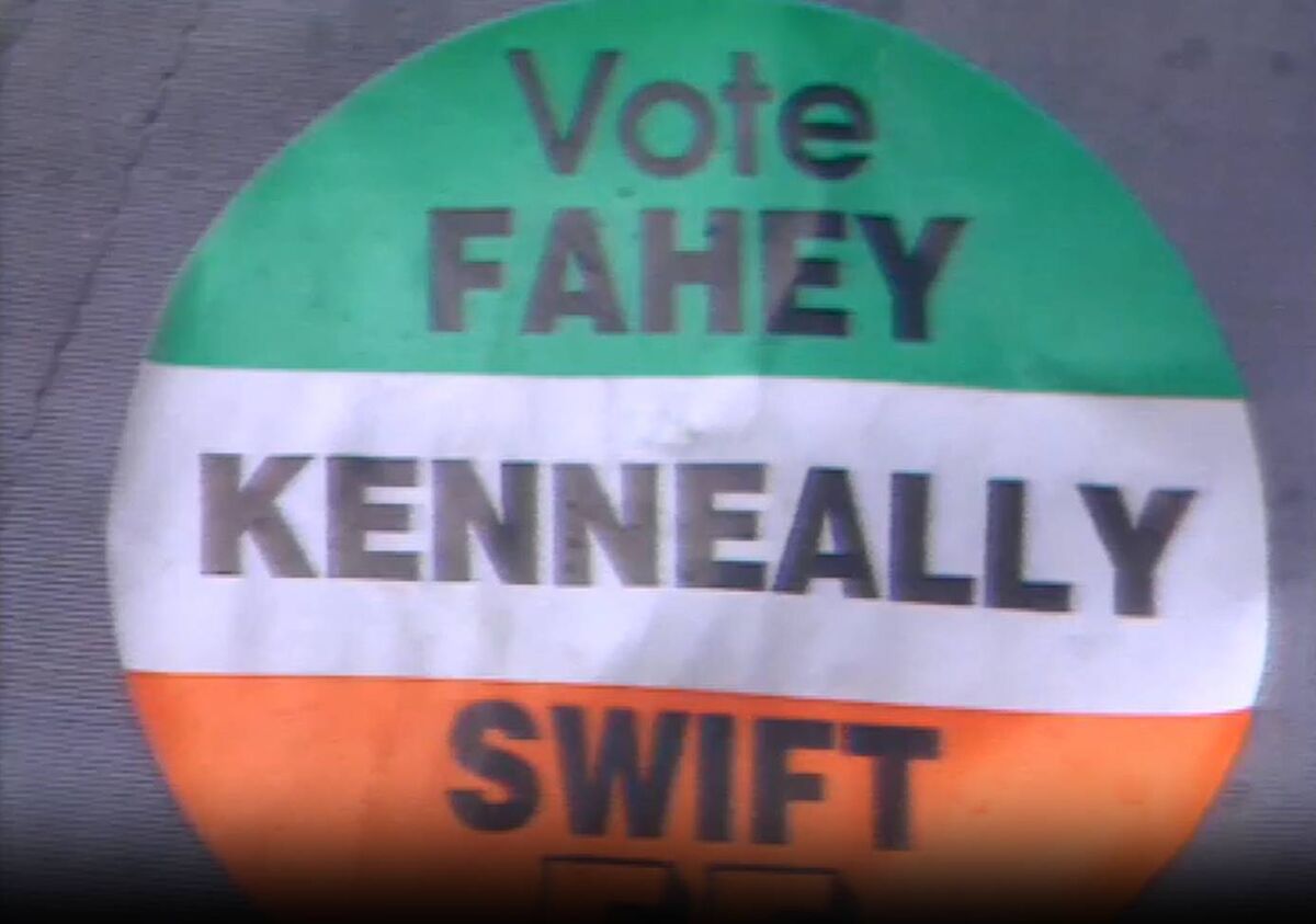 A badge from the 1989 General Election showing the Kenneally name. The Kenneally family were a political dynasty probably unparalleled in Irish political life. A badge from the 1989 General Election showing the Kenneally name. The Kenneally family were a political dynasty probably unparalleled in Irish political life.