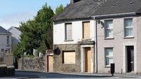 Typical UK terraced housing street derelict