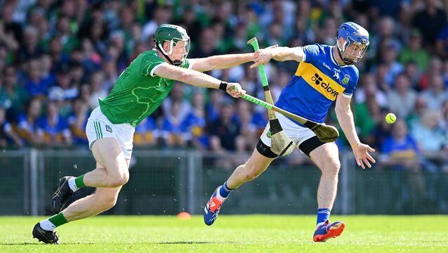 <p>John McGrath of Tipperary in action against William O'Donoghue of Limerick. Pic: Stephen McCarthy/Sportsfile</p>