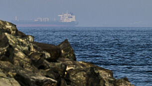 <p>Cargo ships are seen at sea in the Gulf of Oman near the Strait of Hormuz, as viewed from a rocky shoreline near Khor Fakkan, United Arab Emirates. Picture: AP Photo/Fatima Shbair.</p> <p>Cargo ships are seen at sea in the Gulf of Oman near the Strait of Hormuz, as viewed from a rocky shoreline near Khor Fakkan, United Arab Emirates. Picture: AP Photo/Fatima Shbair.</p>