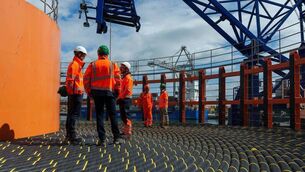 <p>EirGrid representatives onboard the cable laying vessel Calypso</p>