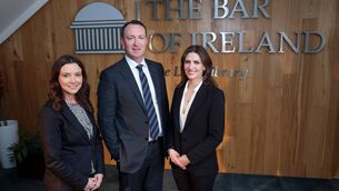 <p>The Bar of Ireland CEO Shirley Coulter, The Bar of Ireland council chairman Seán Guerin SC, and Newcode AI director Donna O'Leary. At the announcement of Newcode's successful bid. File picture</p> <p>The Bar of Ireland CEO Shirley Coulter, The Bar of Ireland council chairman Seán Guerin SC, and Newcode AI director Donna O'Leary. At the announcement of Newcode's successful bid. File picture</p>