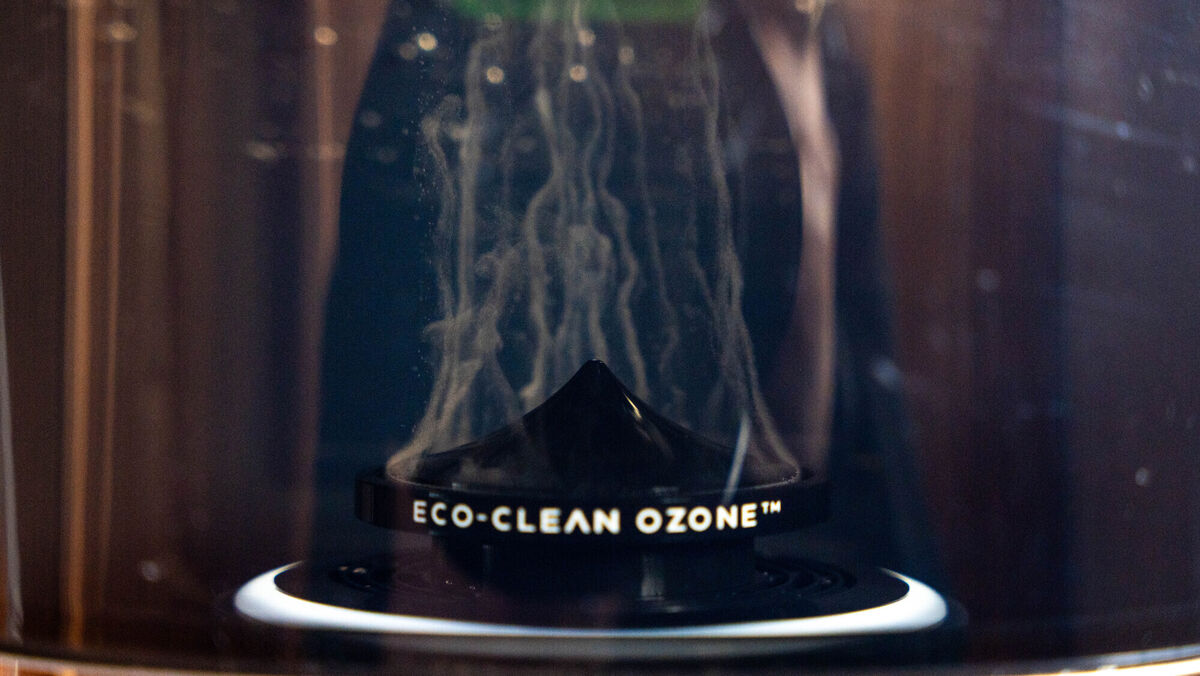 Visible bubbles in the transparent freshwater tank indicate that the integrated ozone function is actively sterilising the vacuum components. Picture: Noel Campion