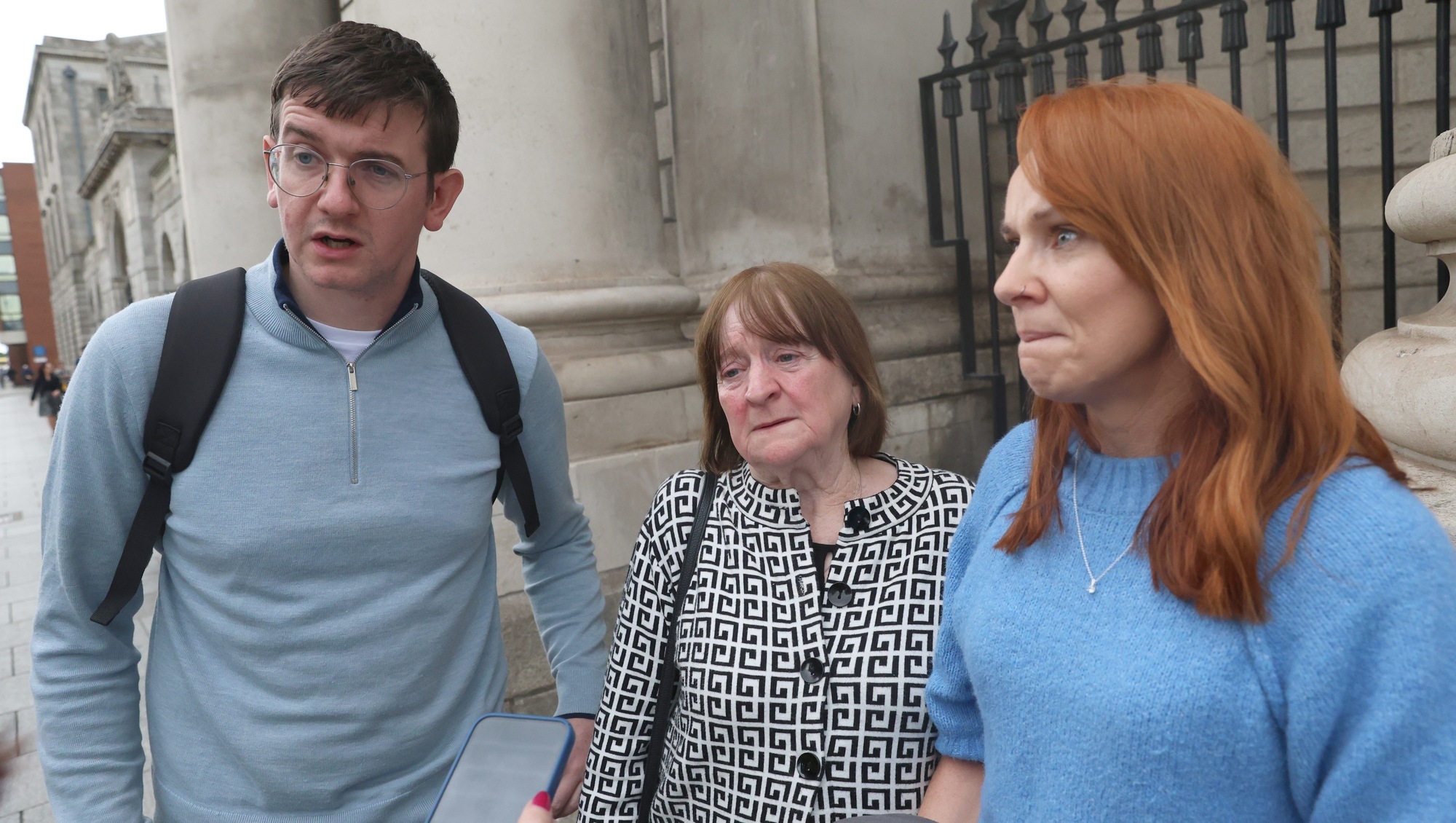 Carmel O’Connor with her children James and Katherine Kirby outside the Four Courts after they settled an action over the death of PJ O’Connor, 71. Picture: Collins Courts