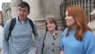 <p>Carmel O’Connor with her children James and Katherine Kirby outside the Four Courts after they settled an action over the death of PJ O’Connor, 71. Picture: Collins Courts</p> <p>Carmel O’Connor with her children James and Katherine Kirby outside the Four Courts after they settled an action over the death of PJ O’Connor, 71. Picture: Collins Courts</p>