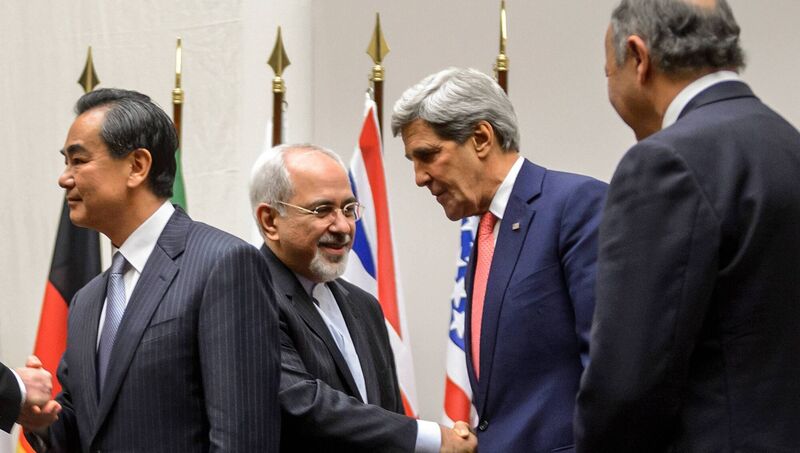 Then Iranian foreign minister Mohammad Javad Zarif shakes hands with then US secretary of state John Kerry following the agreement in 2013. File Picture: Fabrice Coffrini/AFP/Getty Then Iranian foreign minister Mohammad Javad Zarif shakes hands with then US secretary of state John Kerry following the agreement in 2013. File Picture: Fabrice Coffrini/AFP/Getty