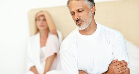 iStock-184275767 (1).jpg Unhappy man with woman in the background