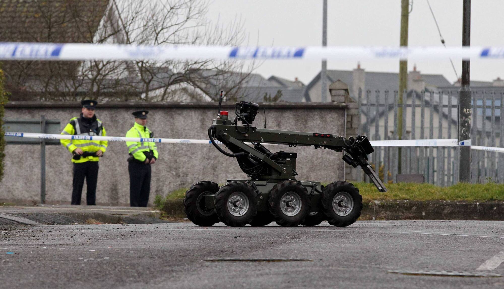 A 2015 file photo of gardaí supervising the removal of a suspect device by the Defence Force’s Explosive Ordnance Disposal unit. The device found in Bandon on Thursday was found at the home of a man who develops accommodation for asylum seekers. File picture: Jim Coughlan