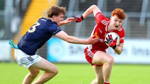 <p>Tyrone's Brian Óg McGuckin with Ryan Crawford of Kildare. Pic: Tom O'Hanlon/Inpho</p> <p>Tyrone's Brian Óg McGuckin with Ryan Crawford of Kildare. Pic: Tom O'Hanlon/Inpho</p>