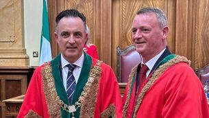 <p>Cork's new Lord Mayor, councillor Damian Boylan, with outgoing lord mayor Fergal Dennehy in the council chamber on Friday. Picture: Shane O'Sullivan</p>