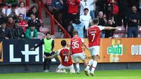 Joe Redmond celebrates scoring a goal with teammates 19/6/2026