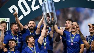 <p>Leinster captain Caelan Doris, left and James Lowe of Leinster lift the cup alongside teammates. Pic: David Fitzgerald/Sportsfile</p> <p>Leinster captain Caelan Doris, left and James Lowe of Leinster lift the cup alongside teammates. Pic: David Fitzgerald/Sportsfile</p>
