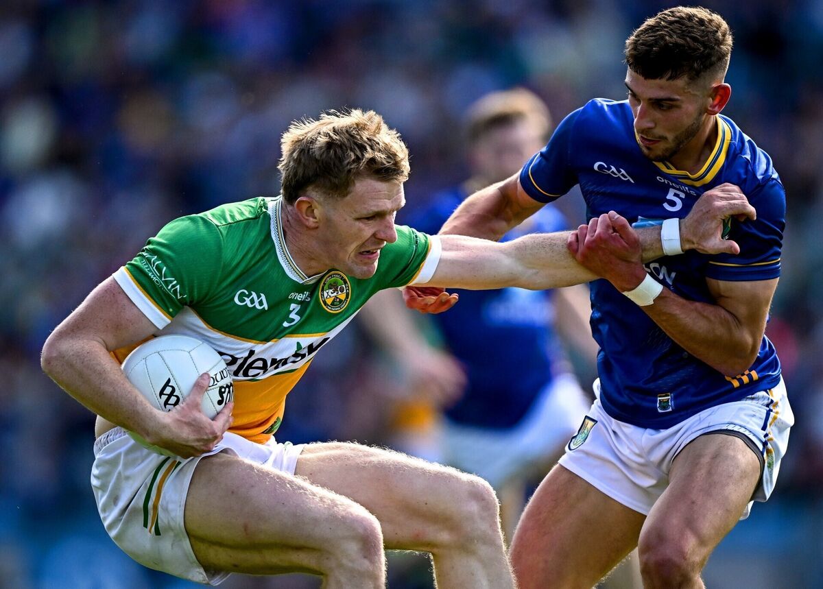 Darragh Fee (Wicklow) tries to wrestle the ball from David Dempsey (Offaly) during the Tailteann Cup semi-final. Picture: Seb Daly/Sportsfile Darragh Fee (Wicklow) tries to wrestle the ball from David Dempsey (Offaly) during the Tailteann Cup semi-final. Picture: Seb Daly/Sportsfile