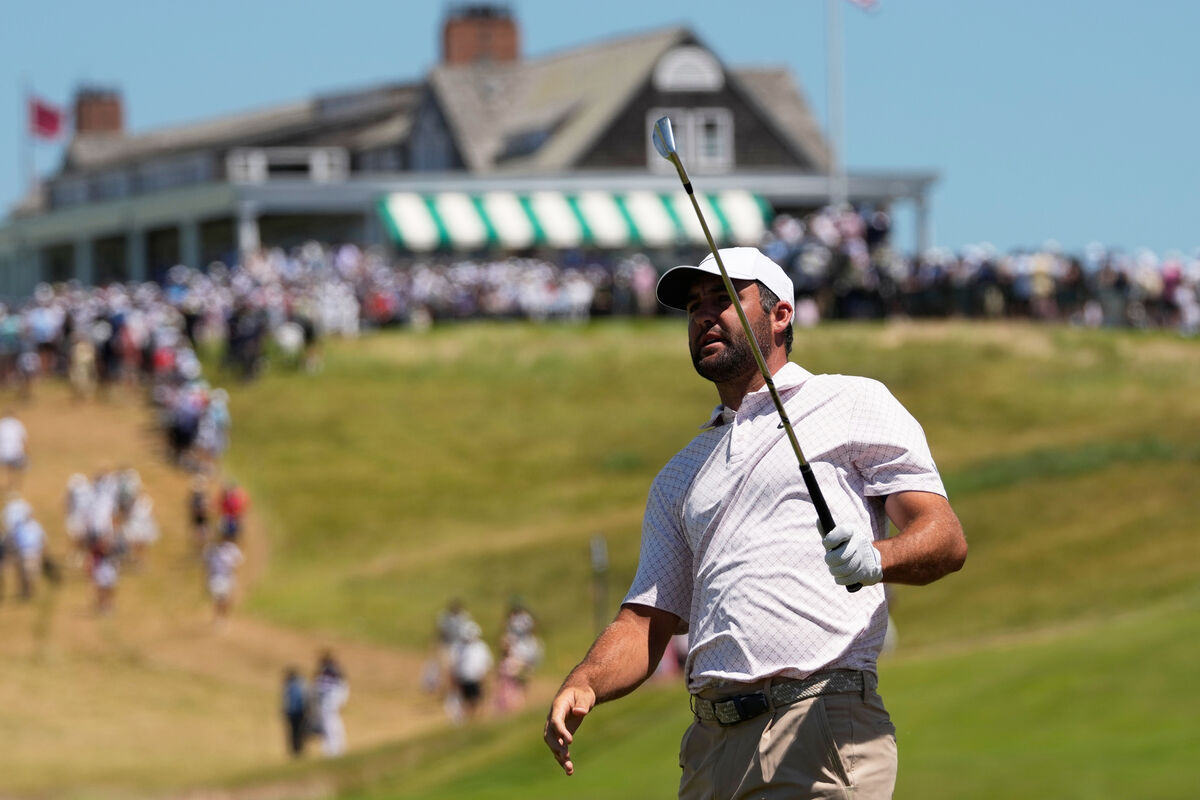 Scottie Scheffler watches his shot on the first hole during the third round. Picture: David J. Phillip/AP Photo