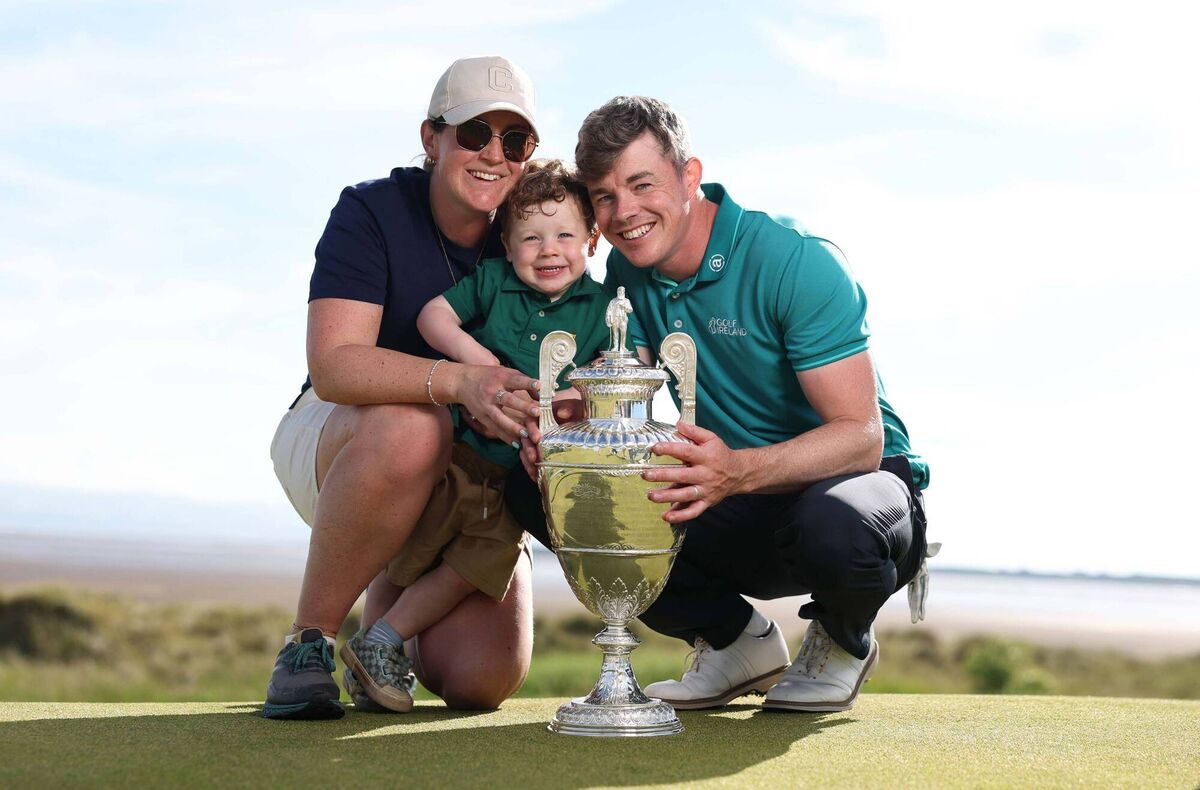 Stuart Grehan celebrates his win at Royal Liverpool with his wife, Carla and son, Kai. Picture: Oisin Keniry/R&A Stuart Grehan celebrates his win at Royal Liverpool with his wife, Carla and son, Kai. Picture: Oisin Keniry/R&A