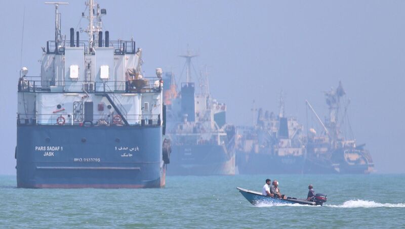 A small motorboat passes anchored vessels in the Strait of Hormuz off Bandar Abbas, Iran. Picture: Amirhosein Khorgooi/ISNA via AP A small motorboat passes anchored vessels in the Strait of Hormuz off Bandar Abbas, Iran. Picture: Amirhosein Khorgooi/ISNA via AP