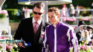 <p>Trainer Aidan O'Brien (left) with Jockey Ryan Moore after Illinois won the Queen Alexandra Stakes on day five of Royal Ascot. Picture: John Walton/PA</p>