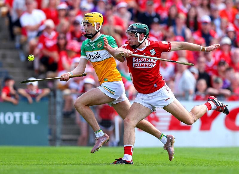 Offaly's Daniel Bourke with Mark Coleman of Cork. Pic: ©INPHO/Tom O'Hanlon Offaly's Daniel Bourke with Mark Coleman of Cork. Pic: ©INPHO/Tom O'Hanlon