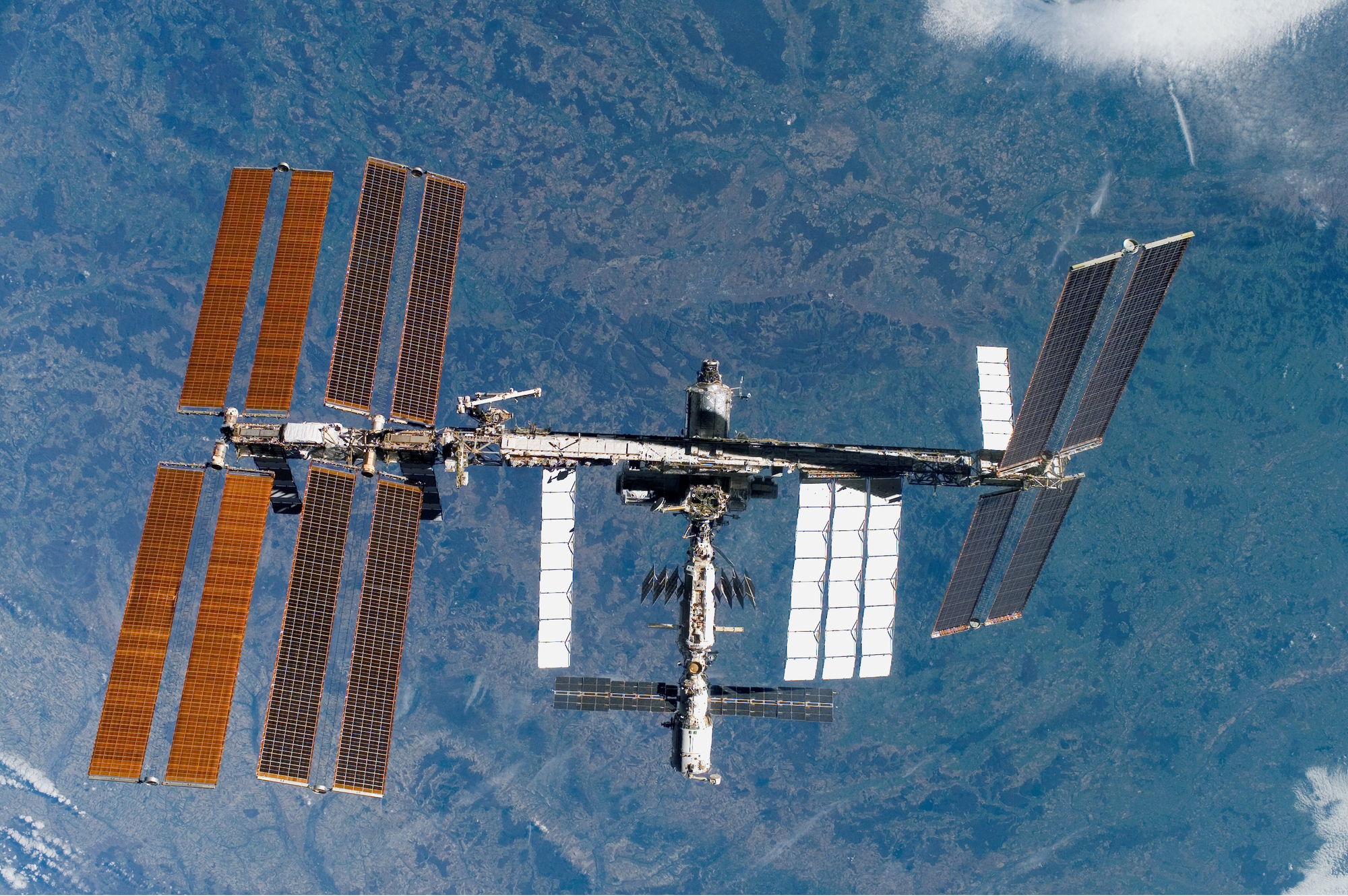 International Space Station astronauts stood ready to evacuate during air leak repairs