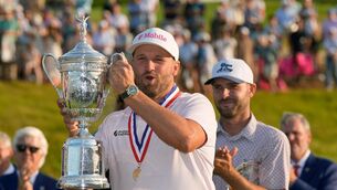 <p>Wyndham Clark holds the trophy at Shinnecock Hills after holding off the surge of Sam Burns. Picture: David J. Phillip/AP </p> <p>Wyndham Clark holds the trophy at Shinnecock Hills after holding off the surge of Sam Burns. Picture: David J. Phillip/AP </p>